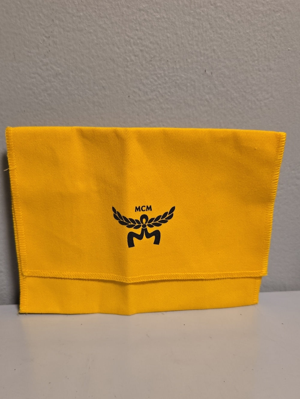 MCM Yellow Wallet Dustbag with Black Logo